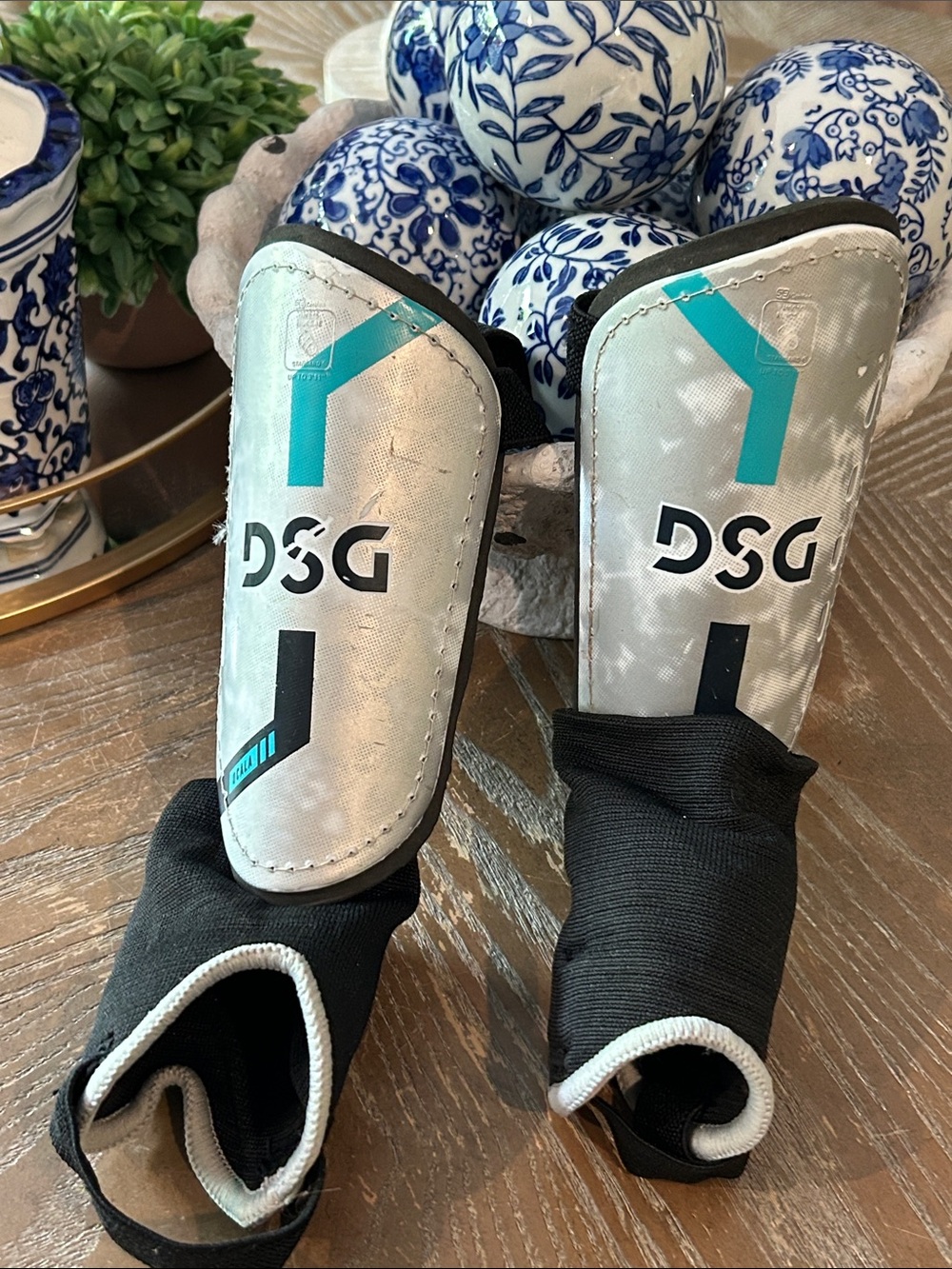 DSG Youth Medium Soccer Shin Guards with Teal & Black Accents
